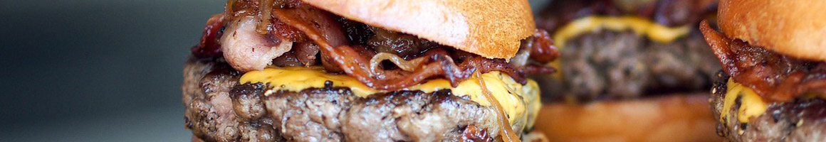 Eating Burger at Liberty Burger Forest Lane restaurant in Dallas, TX.